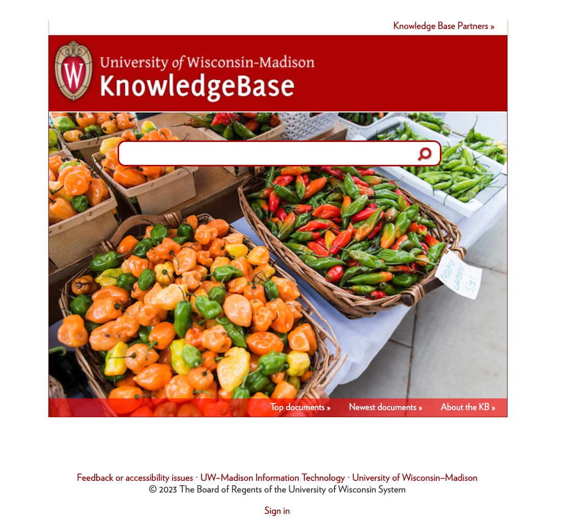 An example of the UW theme v1 legacy custom homepage. Shows a square image with a search bar in the middle
